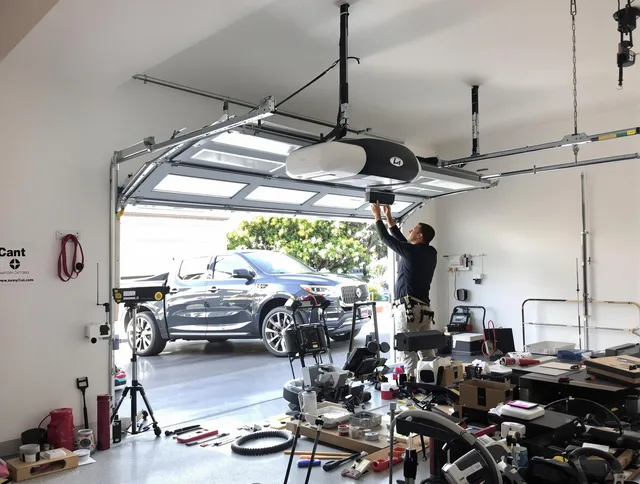 Enfield Garage Door Repair specialist installing smart garage door opener system in Enfield home