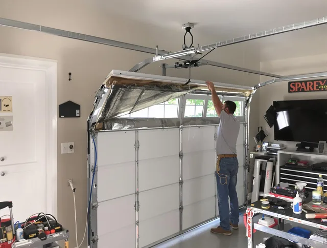 Garage door section replacement by Enfield Garage Door Repair in Enfield